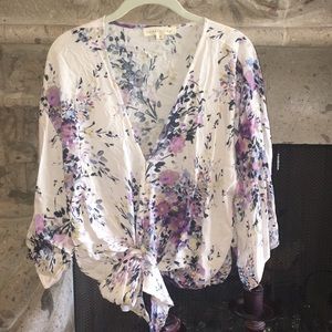 NWOT! Loose, floral 3/4 sleeve top . So cute!